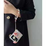 Luxury 3D Crystal Rhinestone Diamond Flowers Sparkle Stunning Stones Pearl Case for Motorola Razr 2026/2025/2024 5G, Cute and Stylish Phone Cover with Wrist Strap for Women and Girls