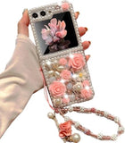 Bling Diamond Case for Moto Razr+/Plus 2025 with Pearl Bracelet Strap Cover,Pink 3D Sparkly Shiny Crystal Rhinestones Flower Girly Shockproof Phone