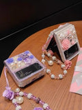 Bling Diamond Case for Moto Razr+/Plus 2025 with Pearl Bracelet Strap Cover,Pink 3D Sparkly Shiny Crystal Rhinestones Flower Girly Shockproof Phone