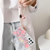 For Samsung Galaxy S25 Glitter Bling Case, Cute Luxury 3D Sparkle Crystal Rhinestones Flowers Diamond Pearl Stunning Stones With Lanyard Wrist Strap Women Girls Case For Galaxy S25 6.2", Pink