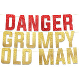 Funny gold glitter "Happy Birthday" banner for men’s milestone and retirement parties