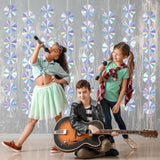 8-piece CD disco banners with hanging swirls for retro 50s-2000s music parties