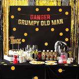 Funny gold glitter "Happy Birthday" banner for men’s milestone and retirement parties