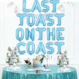 Coastal Bachelorette Decor — “Last Toast on the Coast” Banner & Blue Balloons