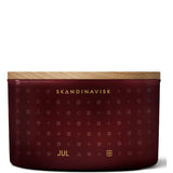 Jul 'Christmas' Scented Candle With 3 Wicks. Fragrance Notes: Baked Gingerbread, Winter Cloves And Spiced Oranges. 16.75 Oz.