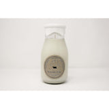 Welcome Home Milk Bottle Candle, 12.5 Ounce