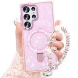 Pink glitter Galaxy S25 Ultra case with kickstand, bracelet, and shockproof protection.