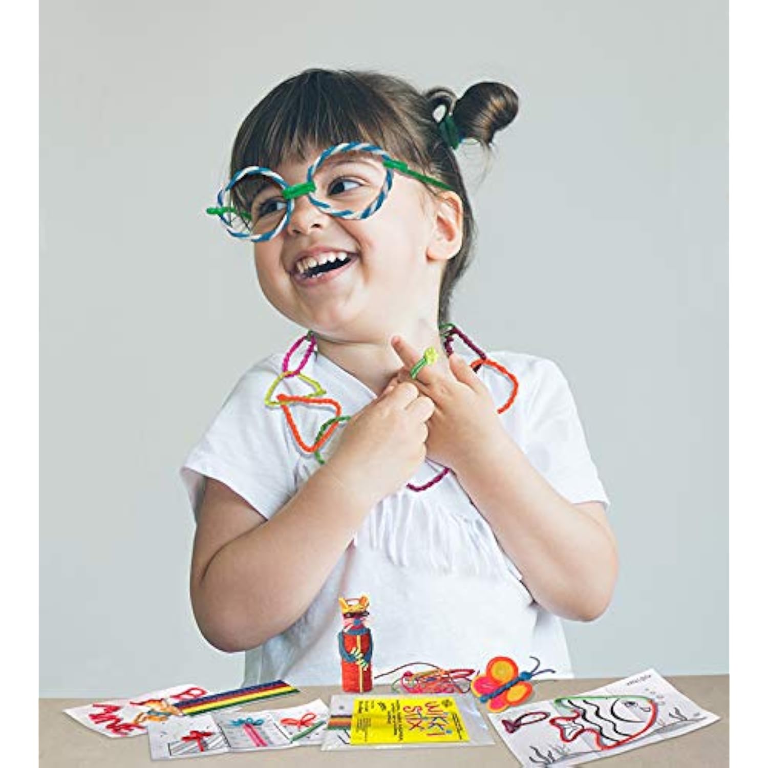 Wikki Stix Assorted Fun Favors, Pack Of 50. Arts And Crafts, Non Toxic, Waxed Yarn. Made In The Usa. 8 Fun Playsheet. Manipulative Toys Used In The Classroom, At Home And While Traveling.