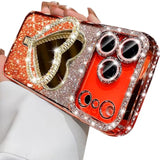 Glitter Mirror Kickstand Case for iPhone 17 Pro Max, Cute Bling Sparkly Rhinestones Diamond Case with Camera Protector & Heart Makeup Mirror Stand Women Girls Cover for iPhone 17 Pro Max, Orange
