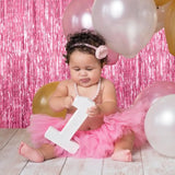 Pink tinsel foil fringe curtain set for birthday and themed party decor