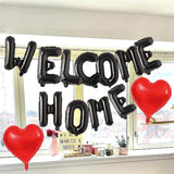 Black “Welcome Home” balloon banner for homecoming party decorations