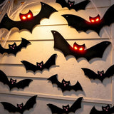 Lighted Halloween Hanging Bats, 12 Pack Halloween Decorations Outdoor Scary Large Black Hanging Flying Bat with LED Lights Spooky Glow Eyes Waterproof for Bedroom Window Wall Decor Indoor Clearance