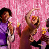 Pink tinsel foil fringe curtain set for birthday and themed party decor
