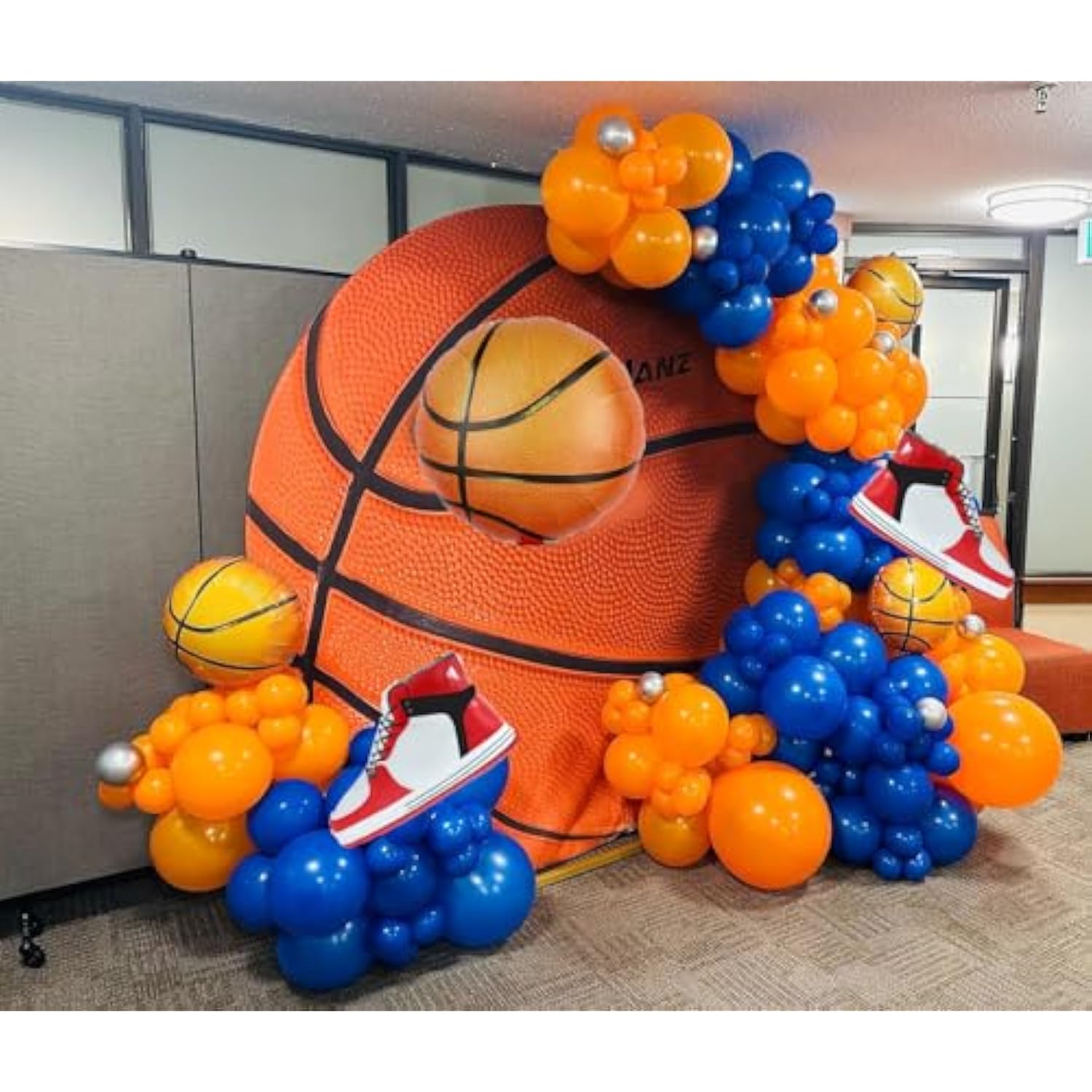Basketball and sneaker foil balloons for sports-themed men’s and boys’ birthday décor