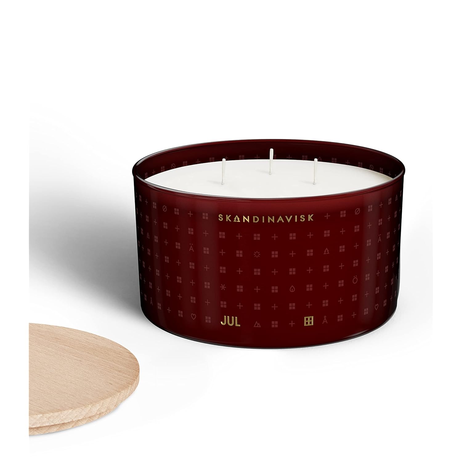 Jul 'Christmas' Scented Candle With 3 Wicks. Fragrance Notes: Baked Gingerbread, Winter Cloves And Spiced Oranges. 16.75 Oz.