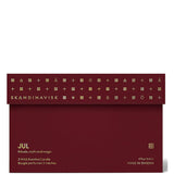 Jul 'Christmas' Scented Candle With 3 Wicks. Fragrance Notes: Baked Gingerbread, Winter Cloves And Spiced Oranges. 16.75 Oz.