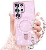 Pink glitter Galaxy S25 Ultra case with kickstand, bracelet, and shockproof protection.